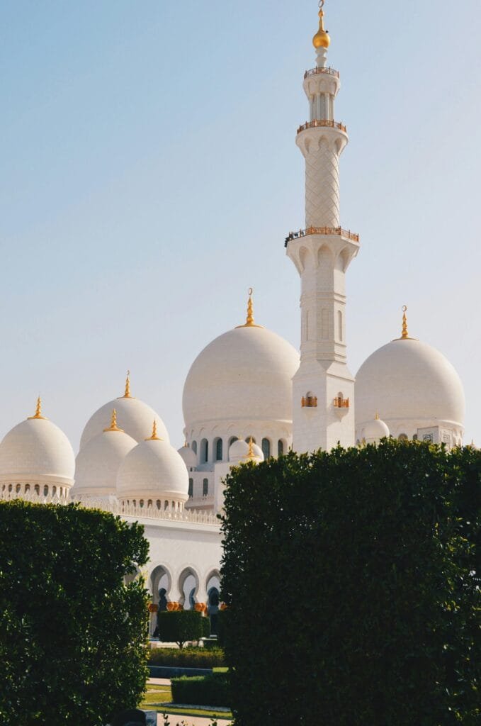 Elegant view of Sheikh Zayed Grand Mosque with its iconic domes and minaret in Abu Dhabi.